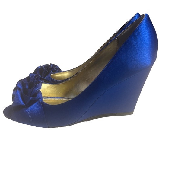 A Touch of Nina Shoes - A pair of blue satin wedge shoes in size 6.5!
